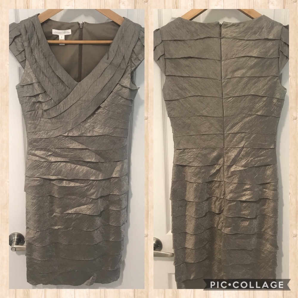 Beautiful fully lined shimmering cocktail dress.